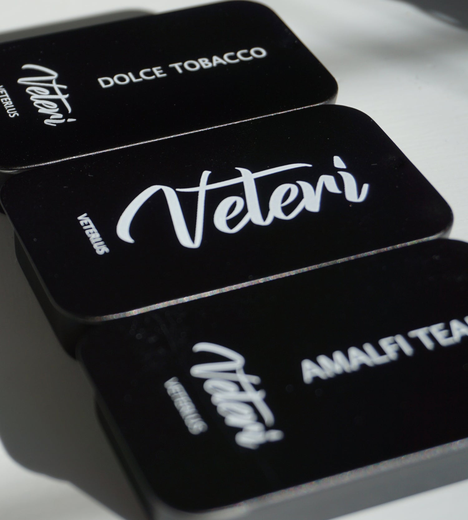 A line up of 3 solid veteri colognes
